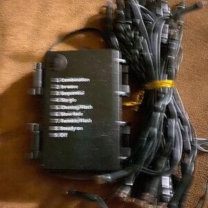 Black String Lights with Control Box 9 different settings. Takes 3 AA batteries